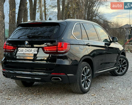 Черный БМВ Х5, объемом двигателя 2 л и пробегом 100 тыс. км за 29900 $, фото 1 на Automoto.ua