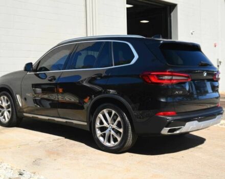 Черный БМВ Х5, объемом двигателя 3 л и пробегом 37 тыс. км за 25000 $, фото 2 на Automoto.ua