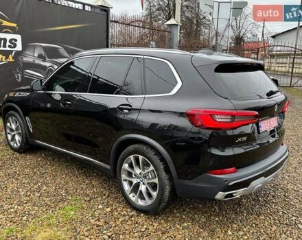 Черный БМВ Х5, объемом двигателя 3 л и пробегом 175 тыс. км за 41500 $, фото 26 на Automoto.ua
