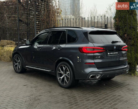 Черный БМВ Х5, объемом двигателя 3 л и пробегом 115 тыс. км за 52900 $, фото 4 на Automoto.ua