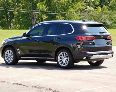 Черный БМВ Х5, объемом двигателя 3 л и пробегом 40 тыс. км за 25000 $, фото 3 на Automoto.ua