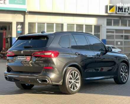 Черный БМВ Х5, объемом двигателя 3 л и пробегом 94 тыс. км за 64940 $, фото 4 на Automoto.ua