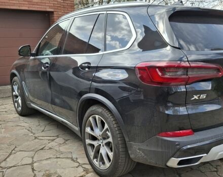 Черный БМВ Х5, объемом двигателя 3 л и пробегом 58 тыс. км за 52500 $, фото 1 на Automoto.ua