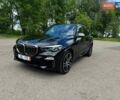 Черный БМВ Х5, объемом двигателя 3 л и пробегом 151 тыс. км за 61999 $, фото 1 на Automoto.ua