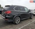 Черный БМВ Х5, объемом двигателя 3 л и пробегом 70 тыс. км за 18000 $, фото 2 на Automoto.ua