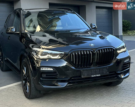 Черный БМВ Х5, объемом двигателя 3 л и пробегом 138 тыс. км за 56500 $, фото 1 на Automoto.ua