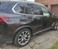Чорний БМВ Х5, об'ємом двигуна 3 л та пробігом 58 тис. км за 49000 $, фото 2 на Automoto.ua
