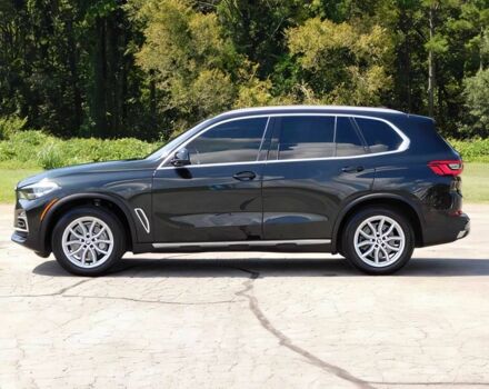 Черный БМВ Х5, объемом двигателя 3 л и пробегом 40 тыс. км за 25000 $, фото 1 на Automoto.ua