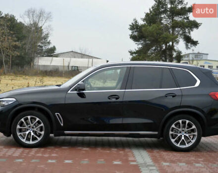 Чорний БМВ Х5, об'ємом двигуна 3 л та пробігом 63 тис. км за 18400 $, фото 4 на Automoto.ua