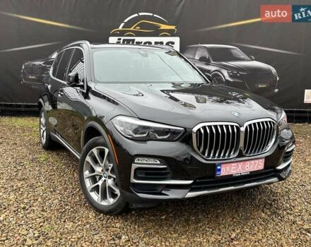 Черный БМВ Х5, объемом двигателя 3 л и пробегом 175 тыс. км за 41500 $, фото 1 на Automoto.ua