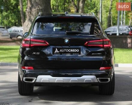 Чорний БМВ Х5, об'ємом двигуна 3 л та пробігом 100 тис. км за 52000 $, фото 4 на Automoto.ua