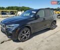 Черный БМВ Х5, объемом двигателя 3 л и пробегом 65 тыс. км за 21500 $, фото 1 на Automoto.ua