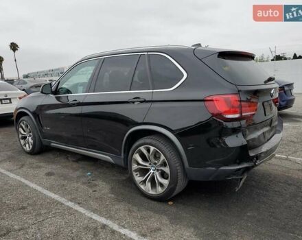 Черный БМВ Х5, объемом двигателя 3 л и пробегом 70 тыс. км за 18000 $, фото 1 на Automoto.ua