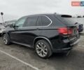 Черный БМВ Х5, объемом двигателя 3 л и пробегом 70 тыс. км за 18000 $, фото 1 на Automoto.ua