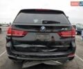 Черный БМВ Х5, объемом двигателя 3 л и пробегом 70 тыс. км за 18000 $, фото 5 на Automoto.ua