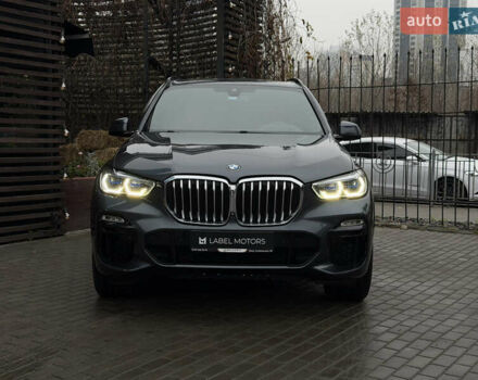 Черный БМВ Х5, объемом двигателя 3 л и пробегом 115 тыс. км за 52900 $, фото 1 на Automoto.ua
