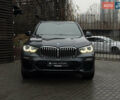 Черный БМВ Х5, объемом двигателя 3 л и пробегом 115 тыс. км за 52900 $, фото 1 на Automoto.ua