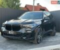 Черный БМВ Х5, объемом двигателя 3 л и пробегом 174 тыс. км за 41500 $, фото 1 на Automoto.ua
