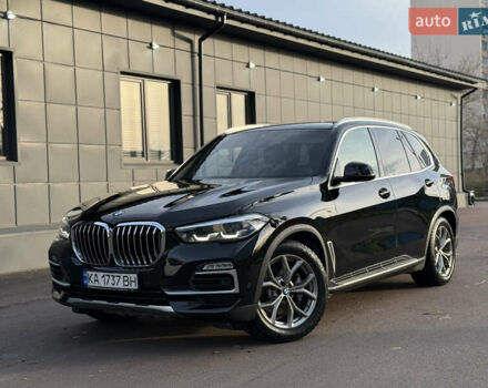 Черный БМВ Х5, объемом двигателя 2.99 л и пробегом 124 тыс. км за 55700 $, фото 1 на Automoto.ua