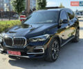 Черный БМВ Х5, объемом двигателя 0 л и пробегом 130 тыс. км за 49900 $, фото 1 на Automoto.ua
