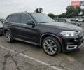 Черный БМВ Х5, объемом двигателя 3 л и пробегом 70 тыс. км за 18000 $, фото 3 на Automoto.ua