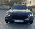 Черный БМВ Х5, объемом двигателя 3 л и пробегом 98 тыс. км за 64800 $, фото 1 на Automoto.ua