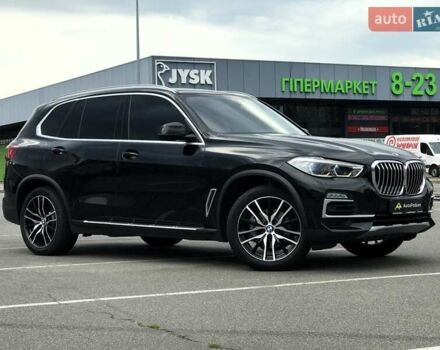 Черный БМВ Х5, объемом двигателя 3 л и пробегом 219 тыс. км за 54500 $, фото 1 на Automoto.ua