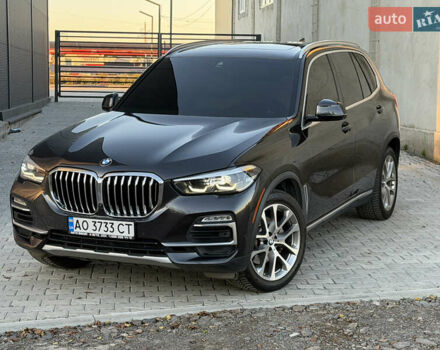 Черный БМВ Х5, объемом двигателя 3 л и пробегом 155 тыс. км за 40000 $, фото 1 на Automoto.ua