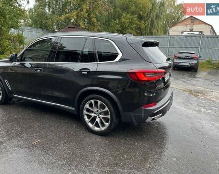 Черный БМВ Х5, объемом двигателя 3 л и пробегом 74 тыс. км за 57500 $, фото 6 на Automoto.ua