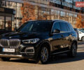 Чорний БМВ Х5, об'ємом двигуна 3 л та пробігом 183 тис. км за 58800 $, фото 2 на Automoto.ua