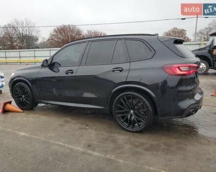 Черный БМВ Х5, объемом двигателя 3 л и пробегом 77 тыс. км за 23000 $, фото 1 на Automoto.ua