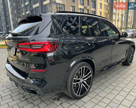 Черный БМВ Х5, объемом двигателя 3 л и пробегом 60 тыс. км за 61900 $, фото 3 на Automoto.ua