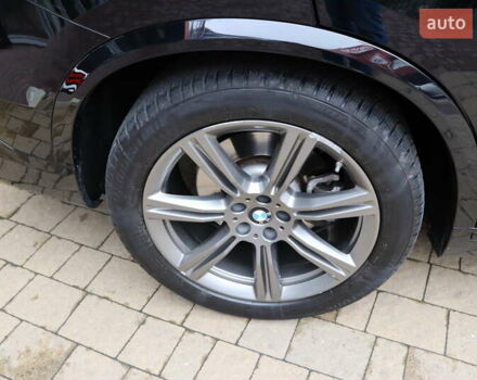 Черный БМВ Х5, объемом двигателя 3 л и пробегом 83 тыс. км за 65900 $, фото 4 на Automoto.ua