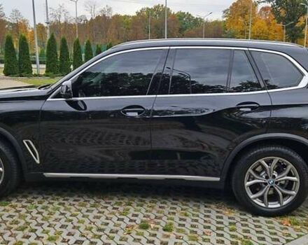 Черный БМВ Х5, объемом двигателя 2 л и пробегом 74 тыс. км за 53000 $, фото 1 на Automoto.ua