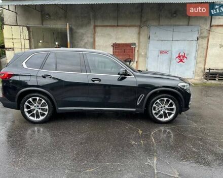 Черный БМВ Х5, объемом двигателя 3 л и пробегом 74 тыс. км за 57500 $, фото 1 на Automoto.ua