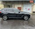 Черный БМВ Х5, объемом двигателя 3 л и пробегом 74 тыс. км за 57500 $, фото 1 на Automoto.ua