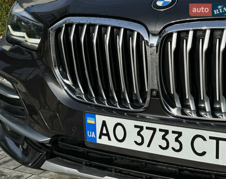 Черный БМВ Х5, объемом двигателя 3 л и пробегом 155 тыс. км за 38990 $, фото 2 на Automoto.ua
