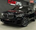 Черный БМВ Х5, объемом двигателя 2.99 л и пробегом 58 тыс. км за 68900 $, фото 1 на Automoto.ua