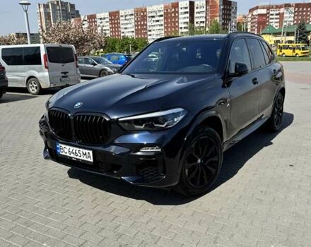 Черный БМВ Х5, объемом двигателя 3 л и пробегом 48 тыс. км за 58900 $, фото 1 на Automoto.ua