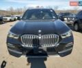 Чорний БМВ Х5, об'ємом двигуна 3 л та пробігом 90 тис. км за 25000 $, фото 4 на Automoto.ua