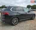 Черный БМВ Х5, объемом двигателя 3 л и пробегом 91 тыс. км за 28900 $, фото 2 на Automoto.ua