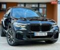 Черный БМВ Х5, объемом двигателя 3 л и пробегом 90 тыс. км за 54900 $, фото 1 на Automoto.ua