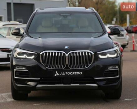 Черный БМВ Х5, объемом двигателя 3 л и пробегом 174 тыс. км за 49500 $, фото 1 на Automoto.ua