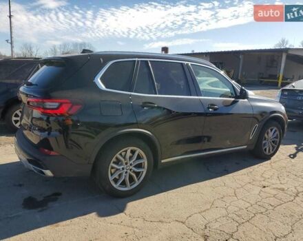 Чорний БМВ Х5, об'ємом двигуна 3 л та пробігом 90 тис. км за 25000 $, фото 2 на Automoto.ua