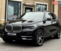Черный БМВ Х5, объемом двигателя 2 л и пробегом 55 тыс. км за 60900 $, фото 1 на Automoto.ua
