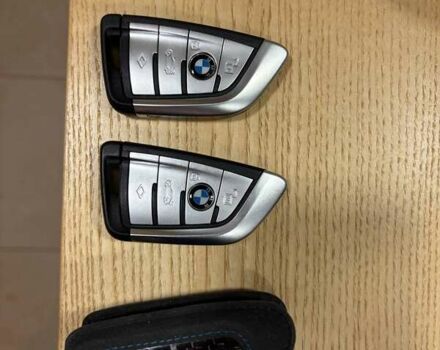 Чорний БМВ Х5, об'ємом двигуна 3 л та пробігом 100 тис. км за 75000 $, фото 1 на Automoto.ua