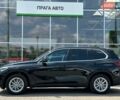 Черный БМВ Х5, объемом двигателя 2 л и пробегом 87 тыс. км за 56499 $, фото 1 на Automoto.ua