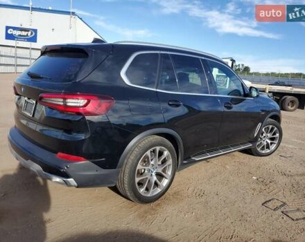 Черный БМВ Х5, объемом двигателя 3 л и пробегом 64 тыс. км за 32000 $, фото 2 на Automoto.ua