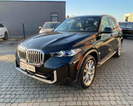 Черный БМВ Х5, объемом двигателя 3 л и пробегом 64 тыс. км за 74950 $, фото 2 на Automoto.ua