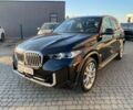 Черный БМВ Х5, объемом двигателя 3 л и пробегом 64 тыс. км за 74950 $, фото 2 на Automoto.ua